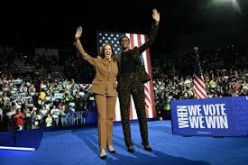 Michelle Obama makes a powerful statement at a Kamala Harris rally, wearing a striking leopard-print suit.